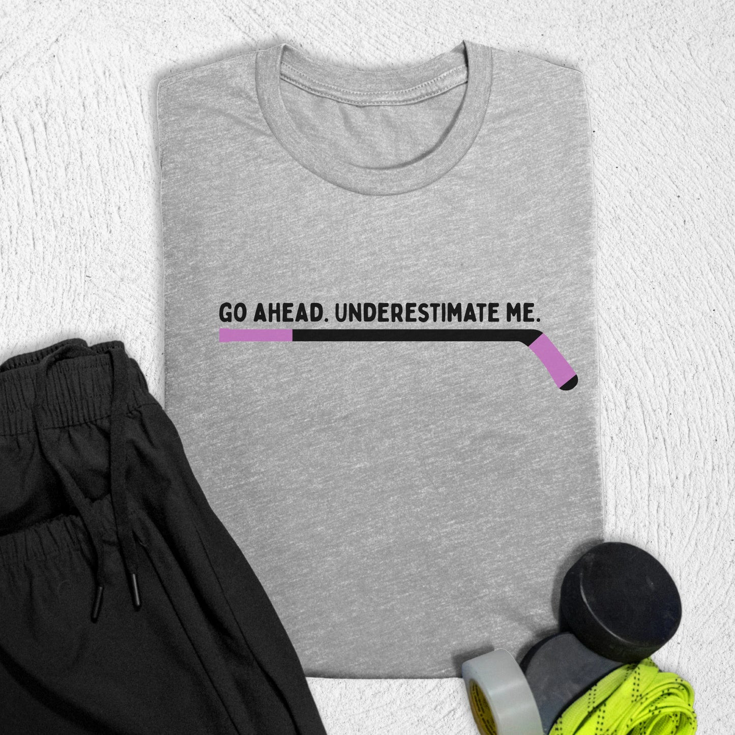 Underestimate Me Stick T-Shirt Athletic Heather / S T-Shirt